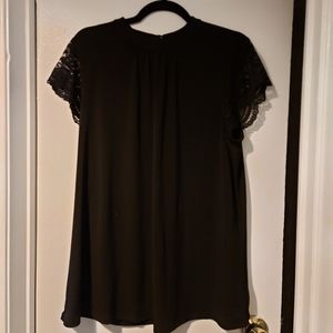 High neck black top with lace sleeves